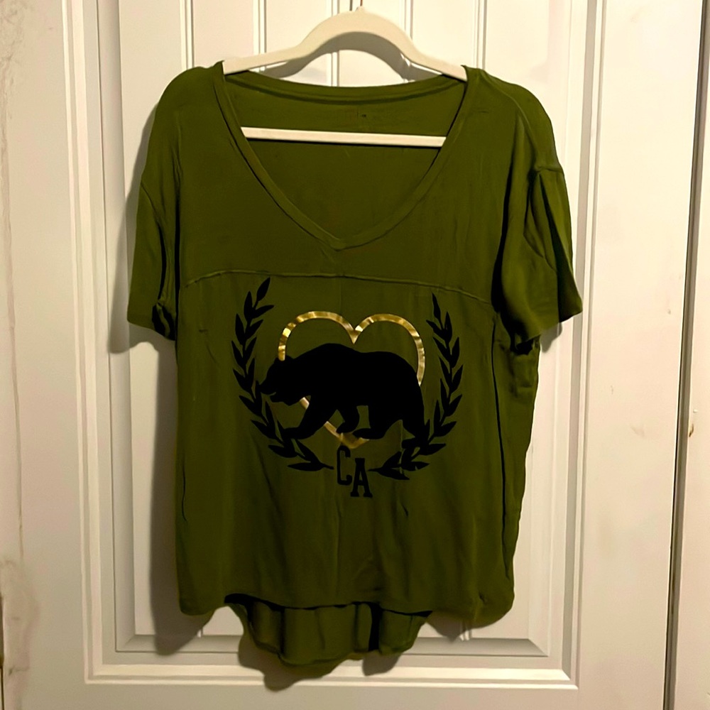 Green short sleeve with bear design on front. Like new